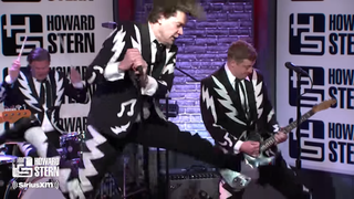 A picture of The Hives performing on Howard Stern's SiriusXM show