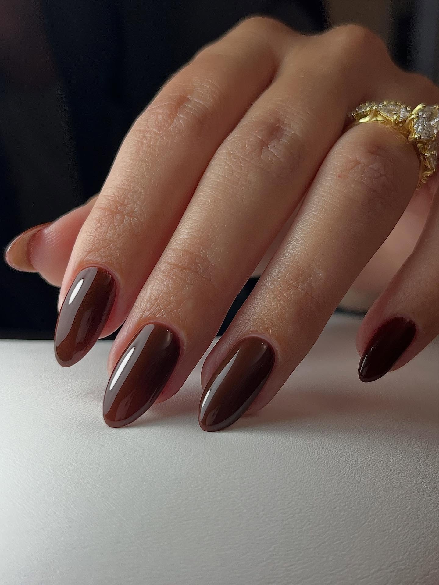 Warm brown nails.