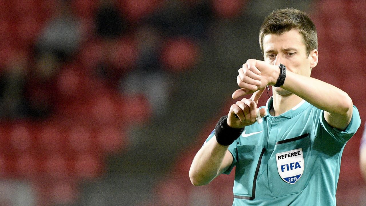 Referee checks his watch