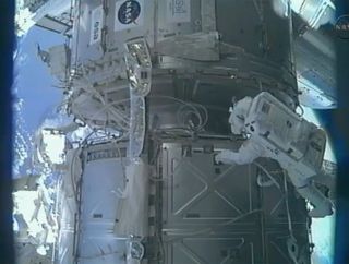Endeavour's STS-134 astronauts Drew Feustel and Greg Chamitoff conduct the first of four planned spacewalks on the outside of the Internaitonal Space Station.