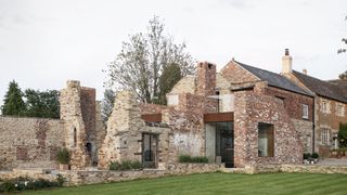  extension built with stone and brick to cottage