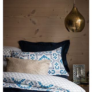 bedroom with printed bedding set