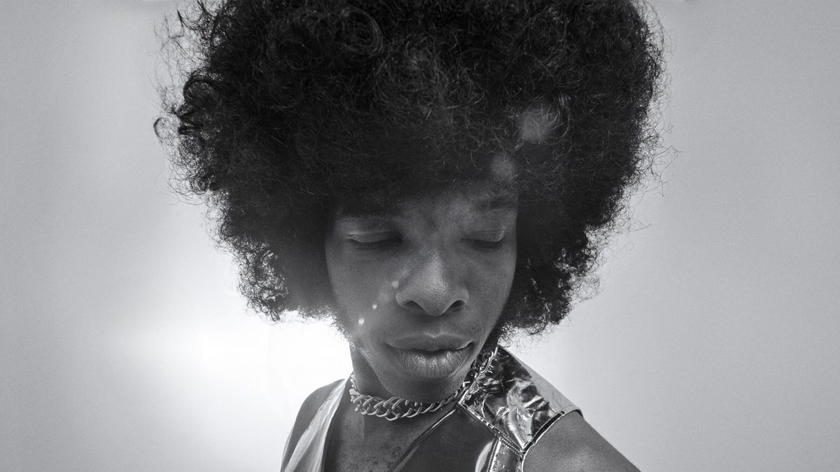 Black and white photo of Sly Stone from SLY LIVES! (aka The Burden of Black Genius)