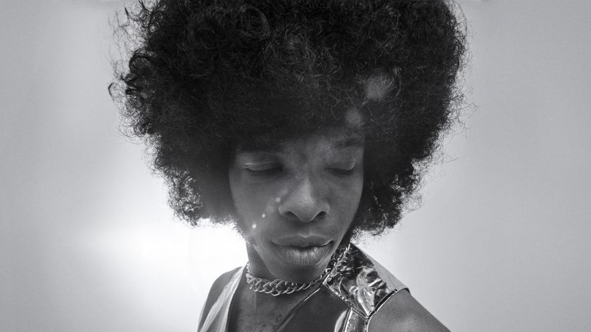 Black and white photo of Sly Stone from SLY LIVES! (aka The Burden of Black Genius)