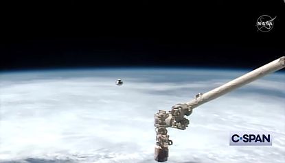 Dragon capsule approaches International Space Station