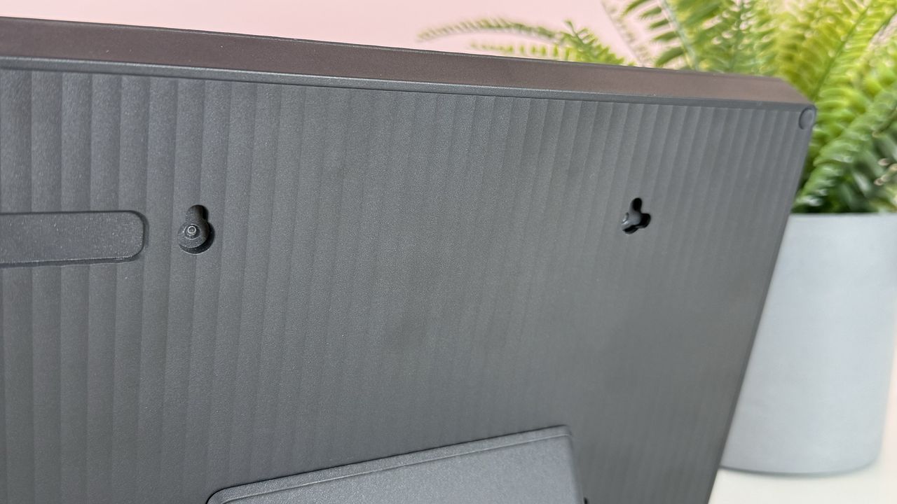 Close up of the hanging fixtures on the rear of the Pexar 11-inch Digital Picture Frame.