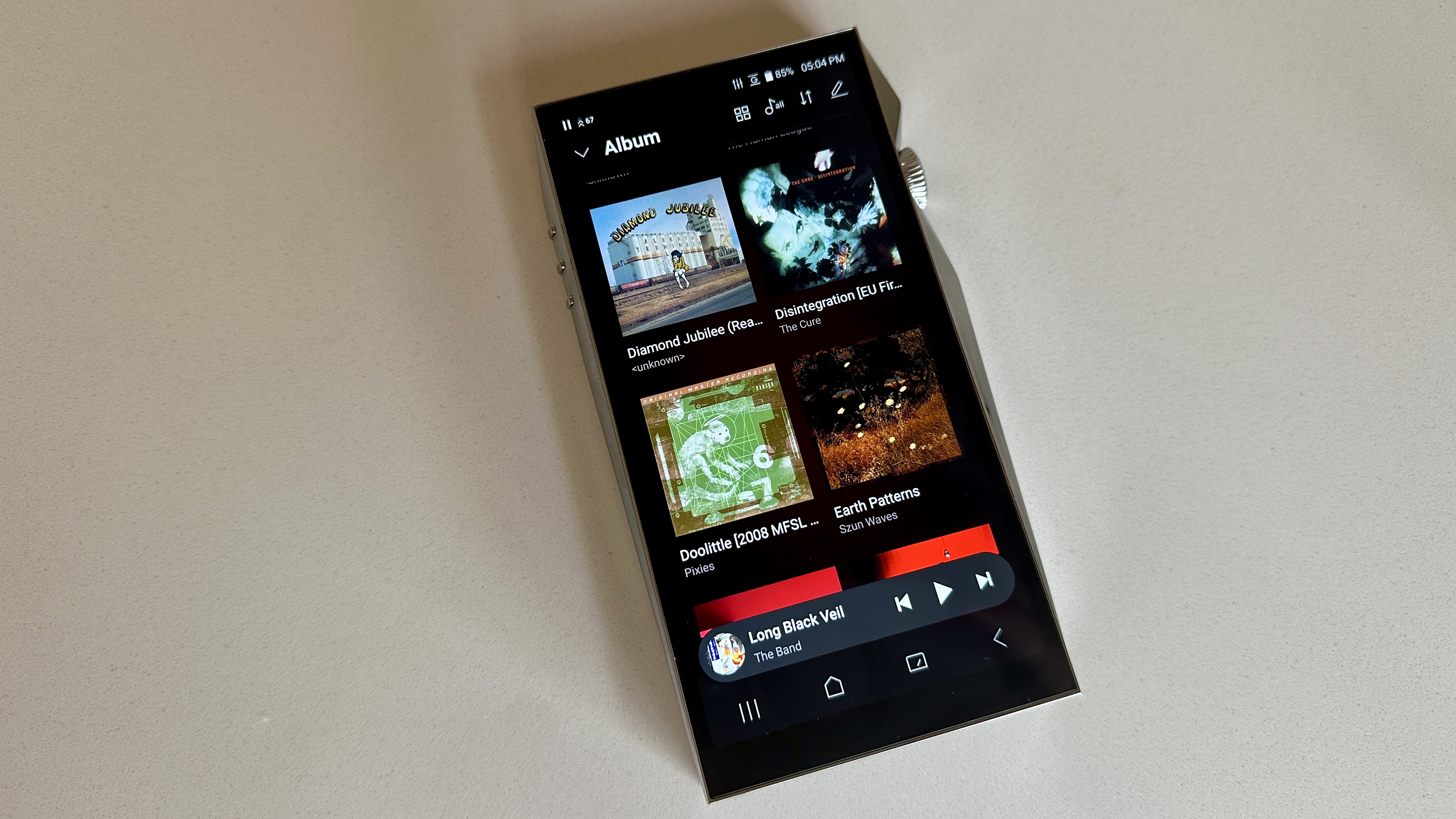 Astell & Kern A&ultima SP4000 portable music player on a white surface