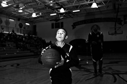 Julian Newman practices before a game.
