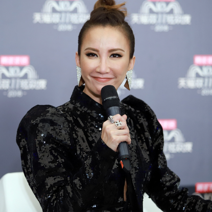 Singer Coco Lee receives interview during rehearsal for 2018 Double 11 Global Shopping Festival on November 10, 2018 in Shanghai, China.