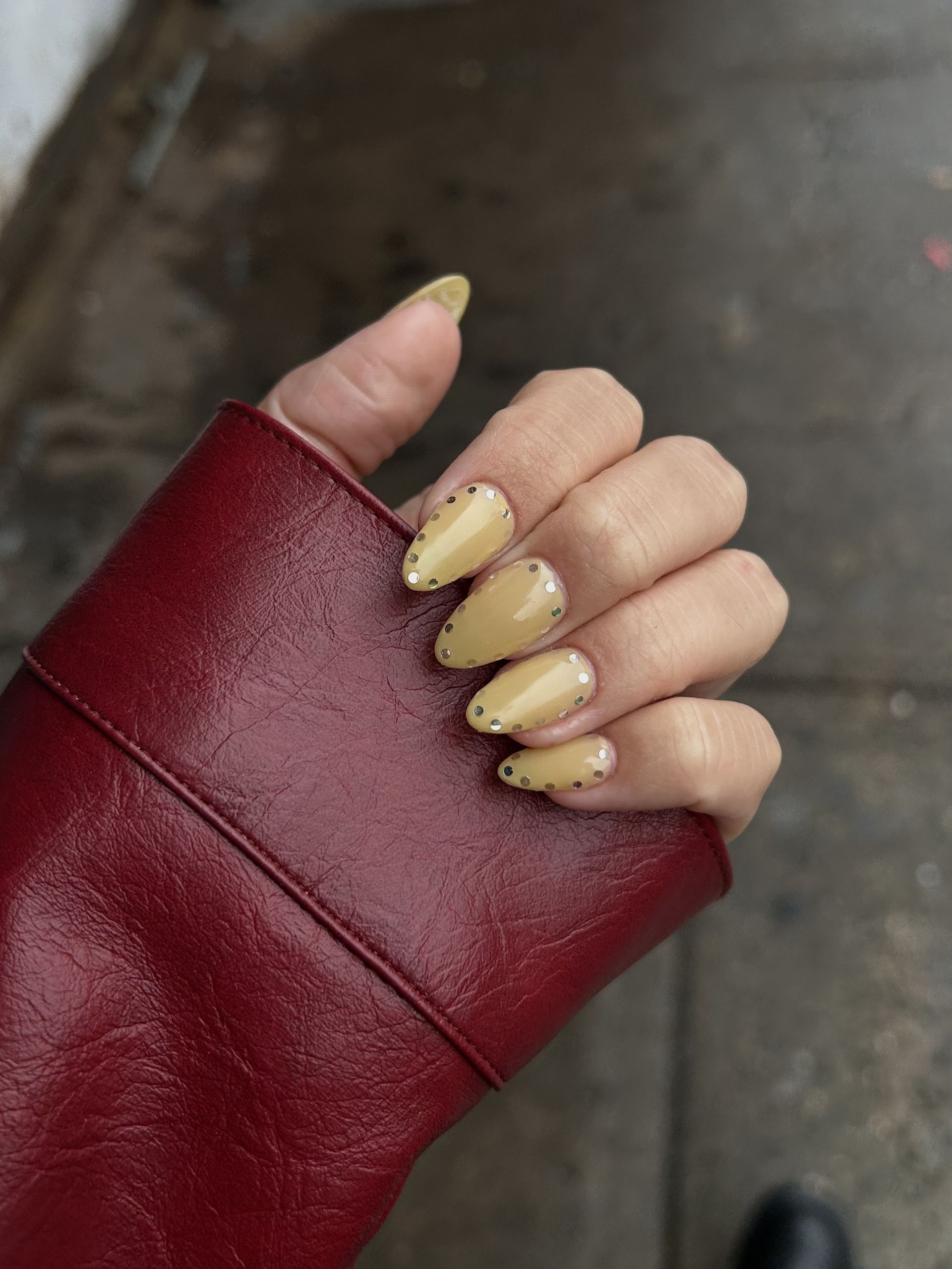 Yellow nails with reflective studs.