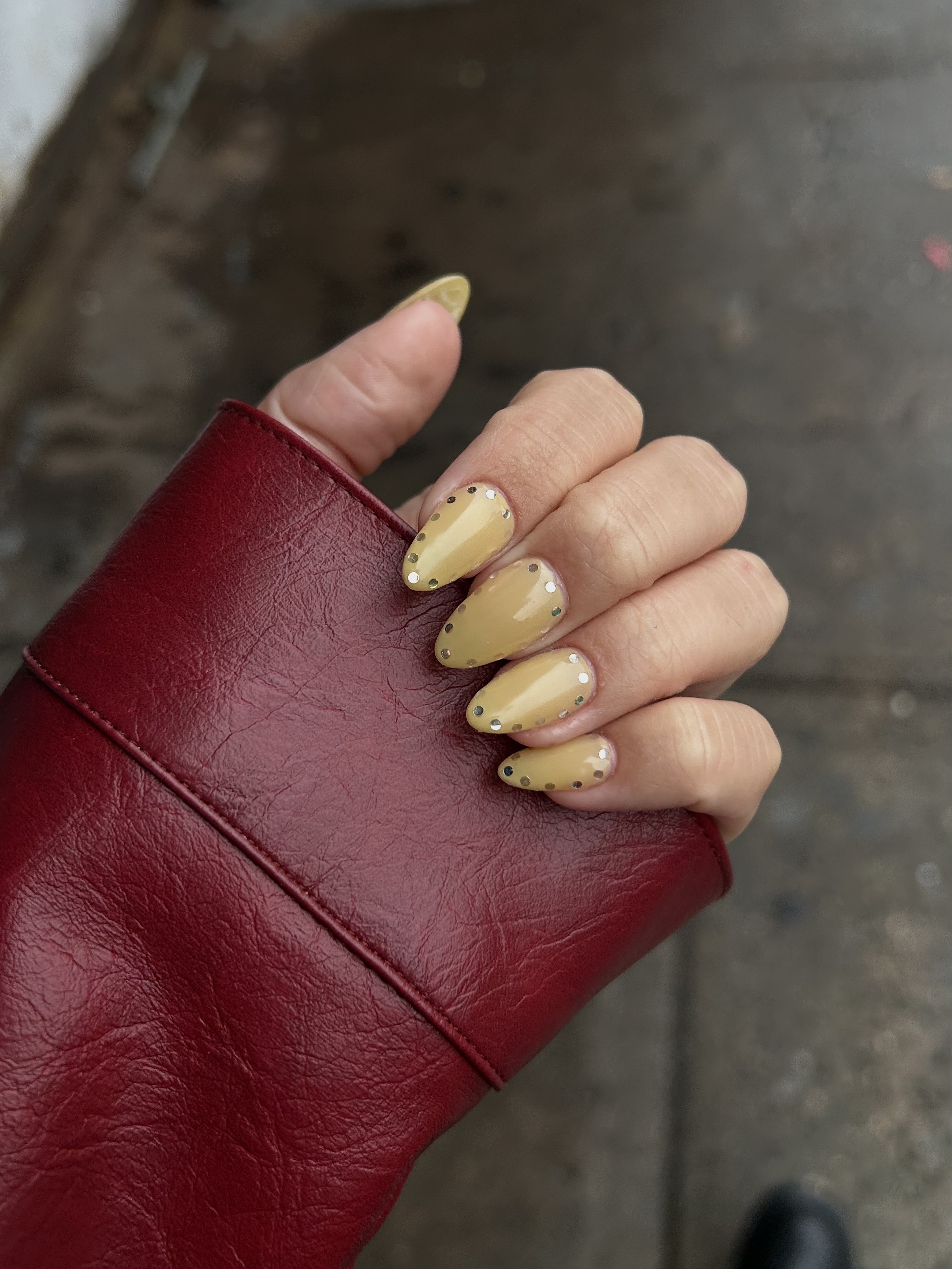 Yellow nails with reflective studs.