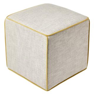 Grey upholstered cube ottoman with mustard piping