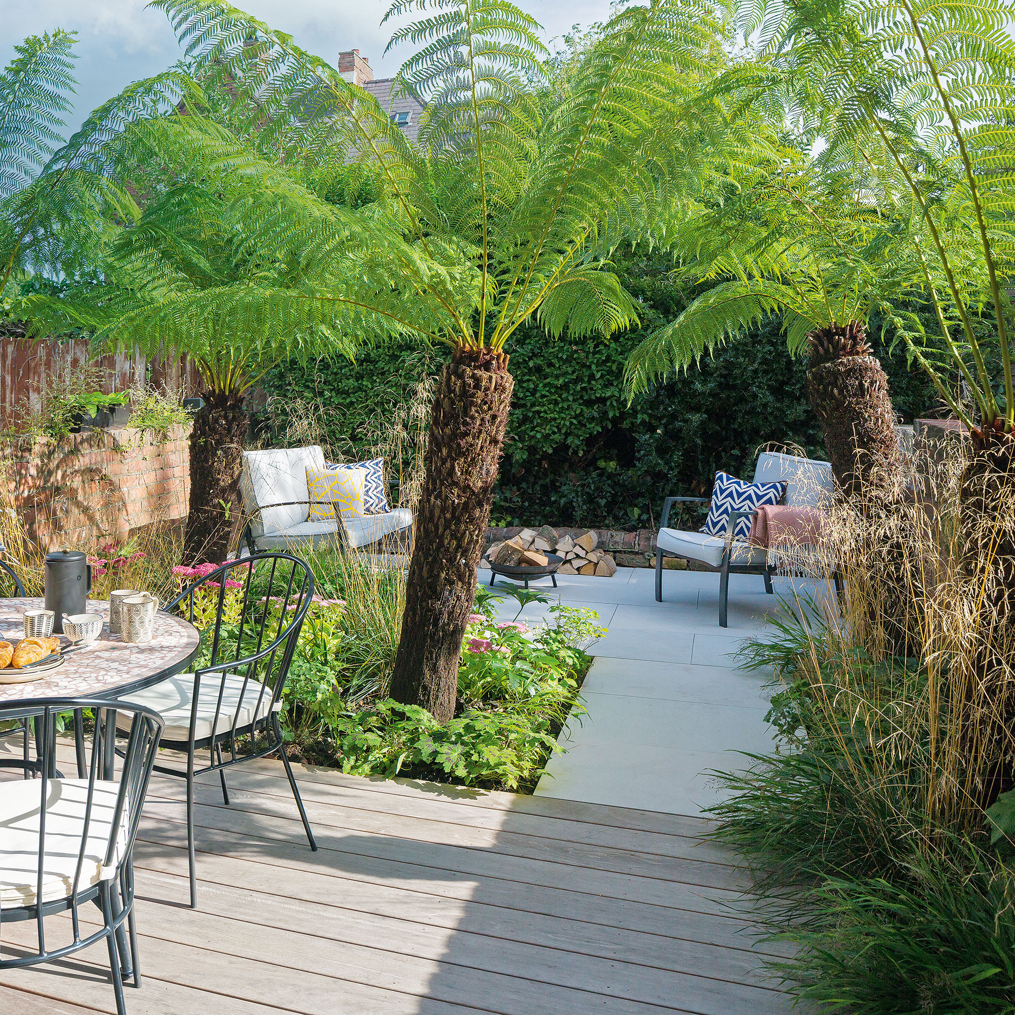 patio area with table and trees