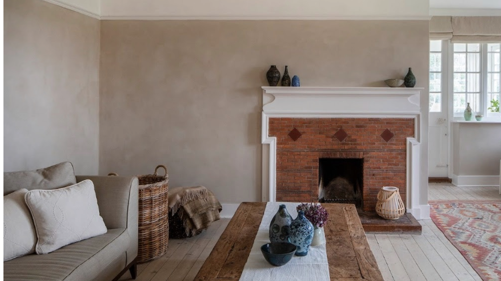 Beige living room with limewash walls