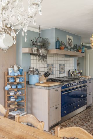 Dutch farmhouse renovation: small kitchen with blue aga pustjens Netherlands farmhouse renovation Joyce Vloet/Cocofeatures.com