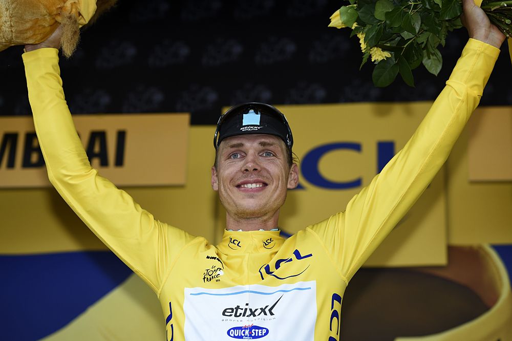Tony Martin donned the maillot jaune after winning the cobbled stage 4