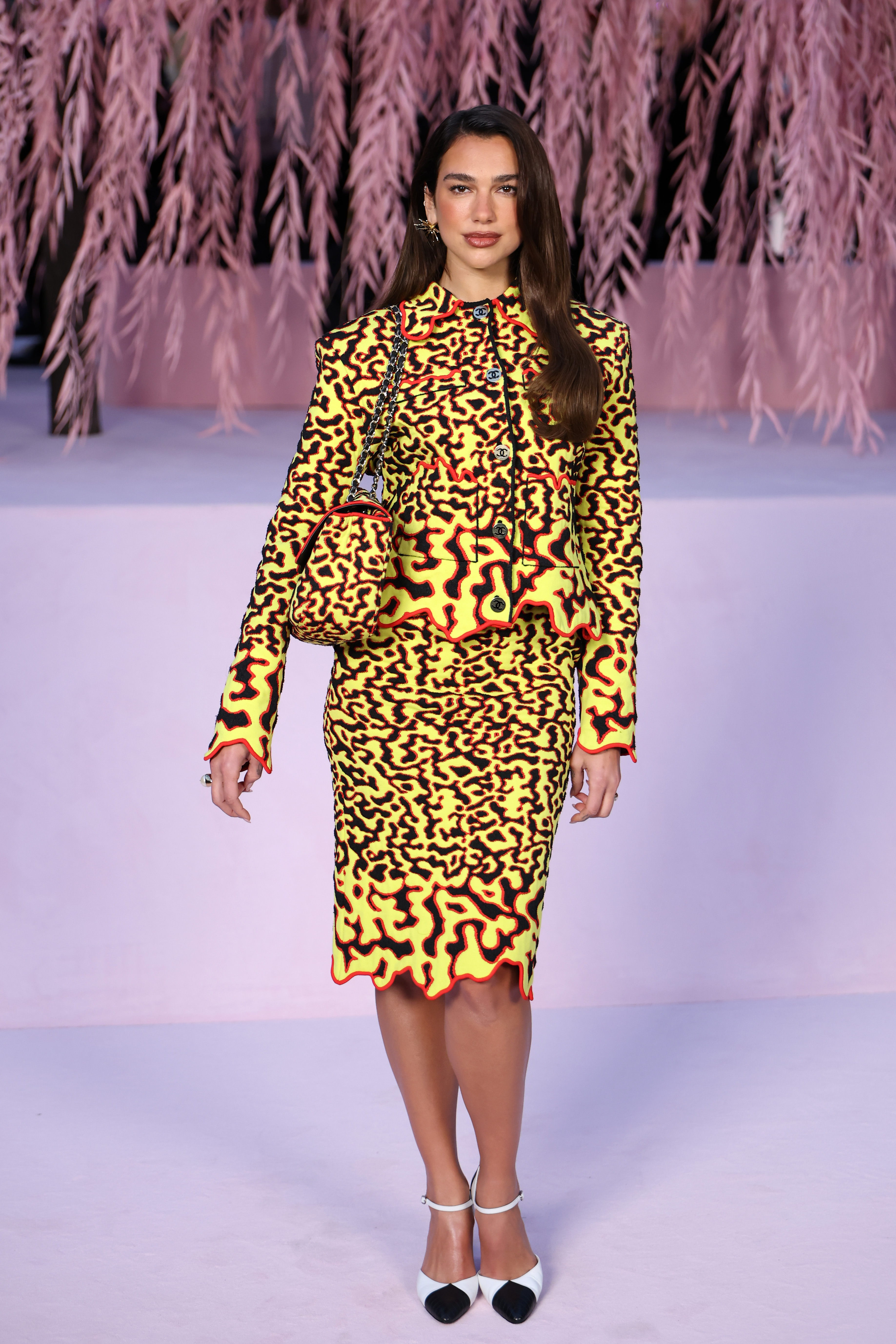 Dua Lipa attended Matthieu Blazy's debut Chanel couture show in a fiery skirt set from his M&amp;eacute;tiers d'Art Spring 2026 collection