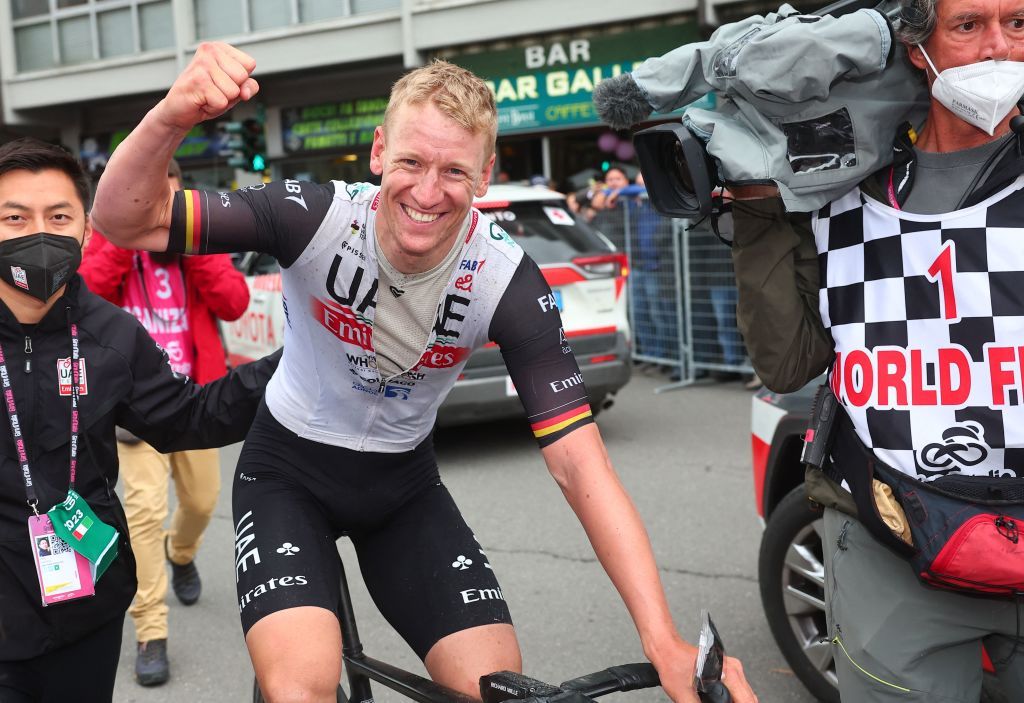 UAE Team Emiratess German rider Pascal Ackermann celebrates after he crossed the finish line to win the eleventh stage of the Giro dItalia 2023 cycling race 219 km between Camaiore and Tortona on May 17 2023 Photo by Luca Bettini AFP Photo by LUCA BETTINIAFP via Getty Images
