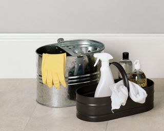 room with rubber gloves and cleaning equipment