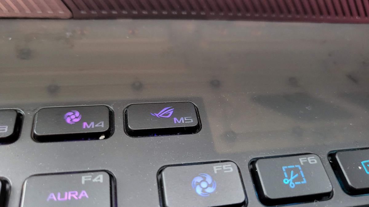 Asus ROG Strix Scar 18 (2023) on a stool