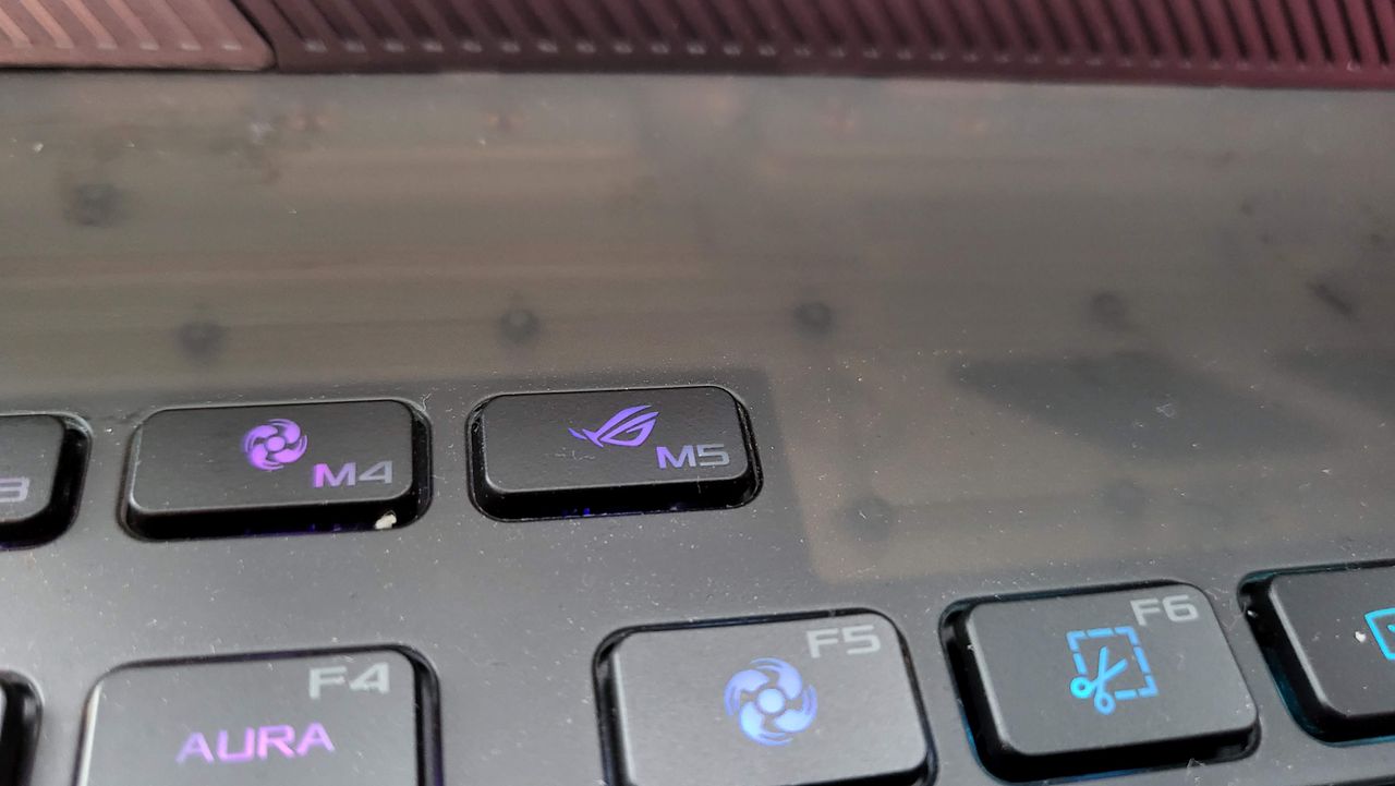 Asus ROG Strix Scar 18 (2023) on a stool