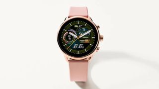 A Fossil Gen 6 Wellness Edition with a pink strap