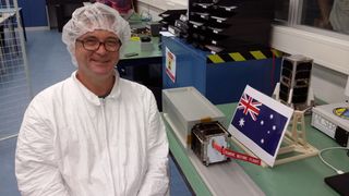 The University of Sydney’s Prof Iver Cairns with its i-INSPIRE-2 cubesat.