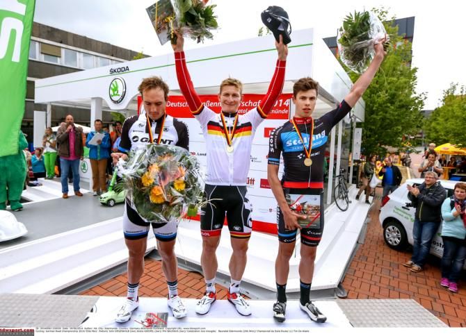 The 2014 German road race podium with Andre Greipel in the national jersey