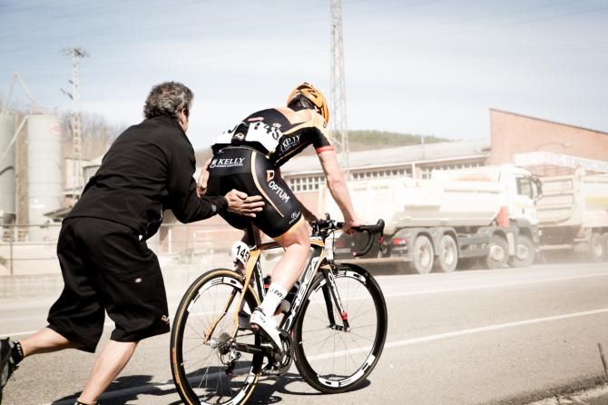 Eric Young gets a push after an early race flat.