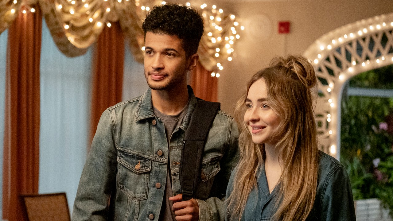 Jordan Fisher as Jake Taylor, Sabrina Carpenter as Quinn Ackerman of Work It.