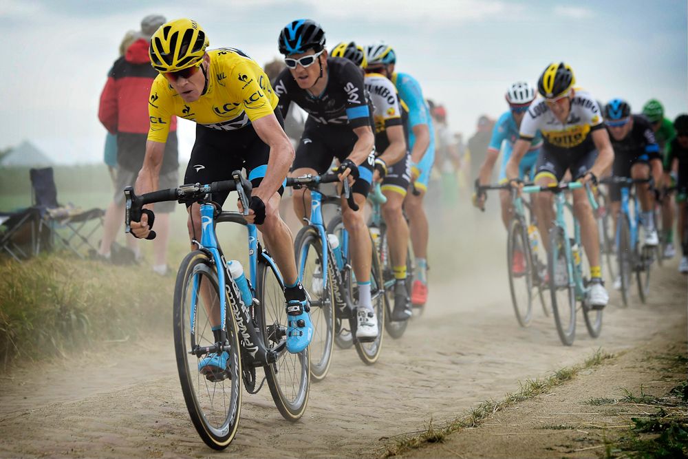 CHris Froome and Geraint Thomas ride the cobbles for Team Sky.