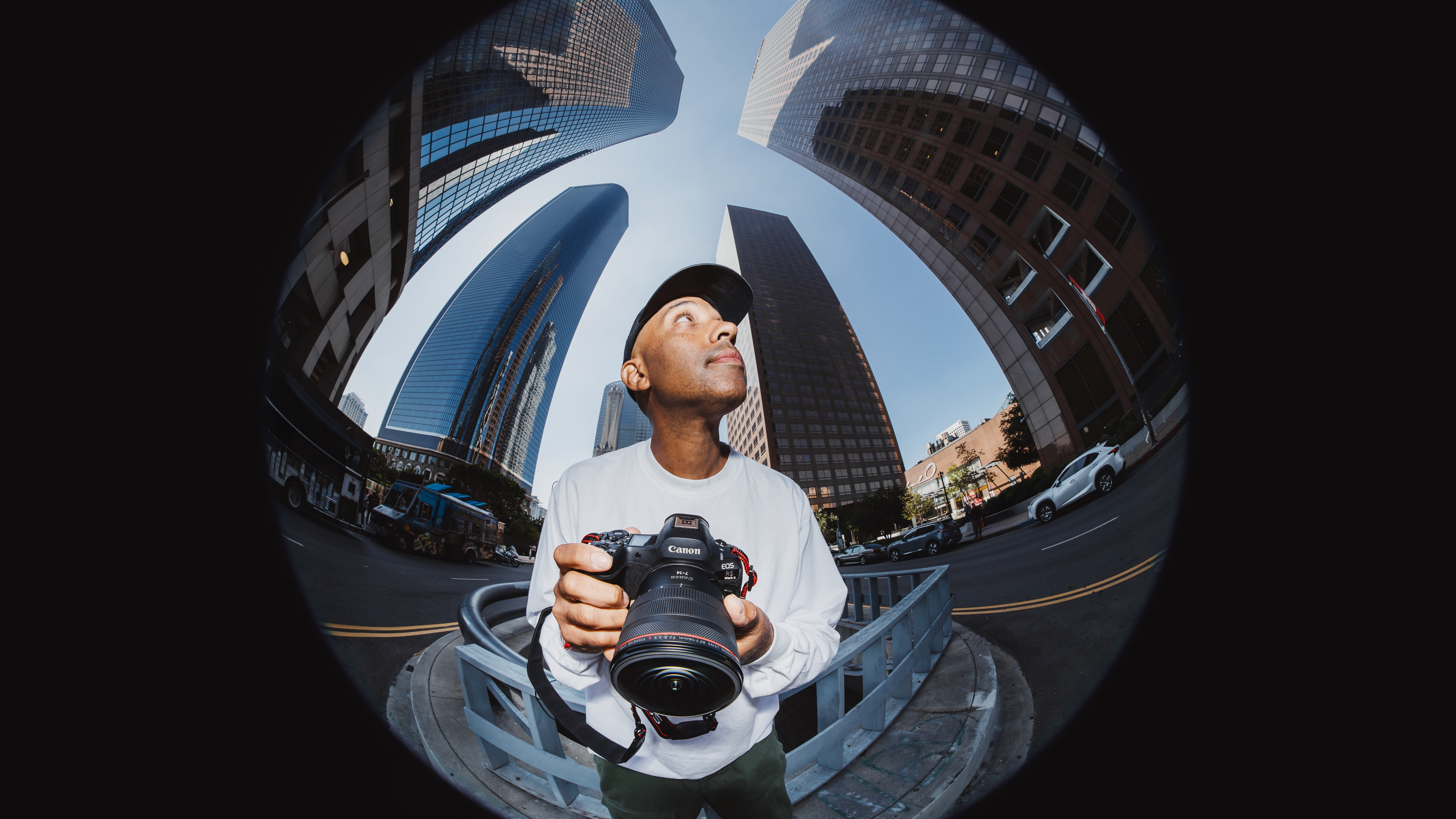A photographer using the Canon RF 7-14mm f/2.8-3.5L Fisheye STM