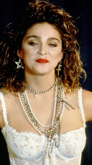 madonna wearing lace white bustier
