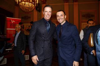Mario Cipollini with Ivan Basso at an event to launch the Cuneo-Pinerolo stage of the 2019 Giro d'Italia.