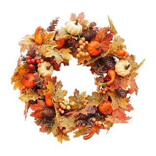 Halloween wreath with pumpkins and orange foliage 