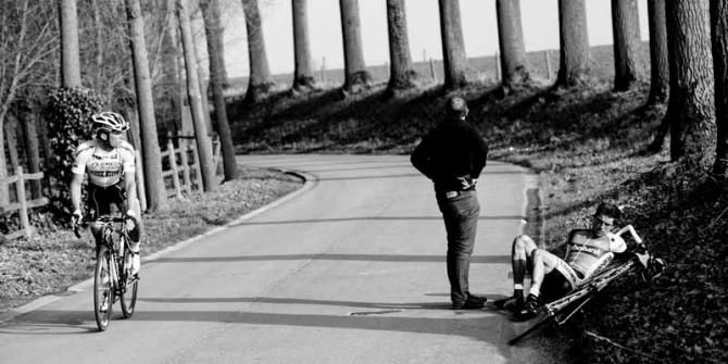 Iljo Keisse looks over at the fallen figure of Theo Bos in the final kilometer of the Nokere Koerse