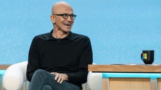Satya Nadella laughing at the Microsoft 50th Anniversary Copilot event