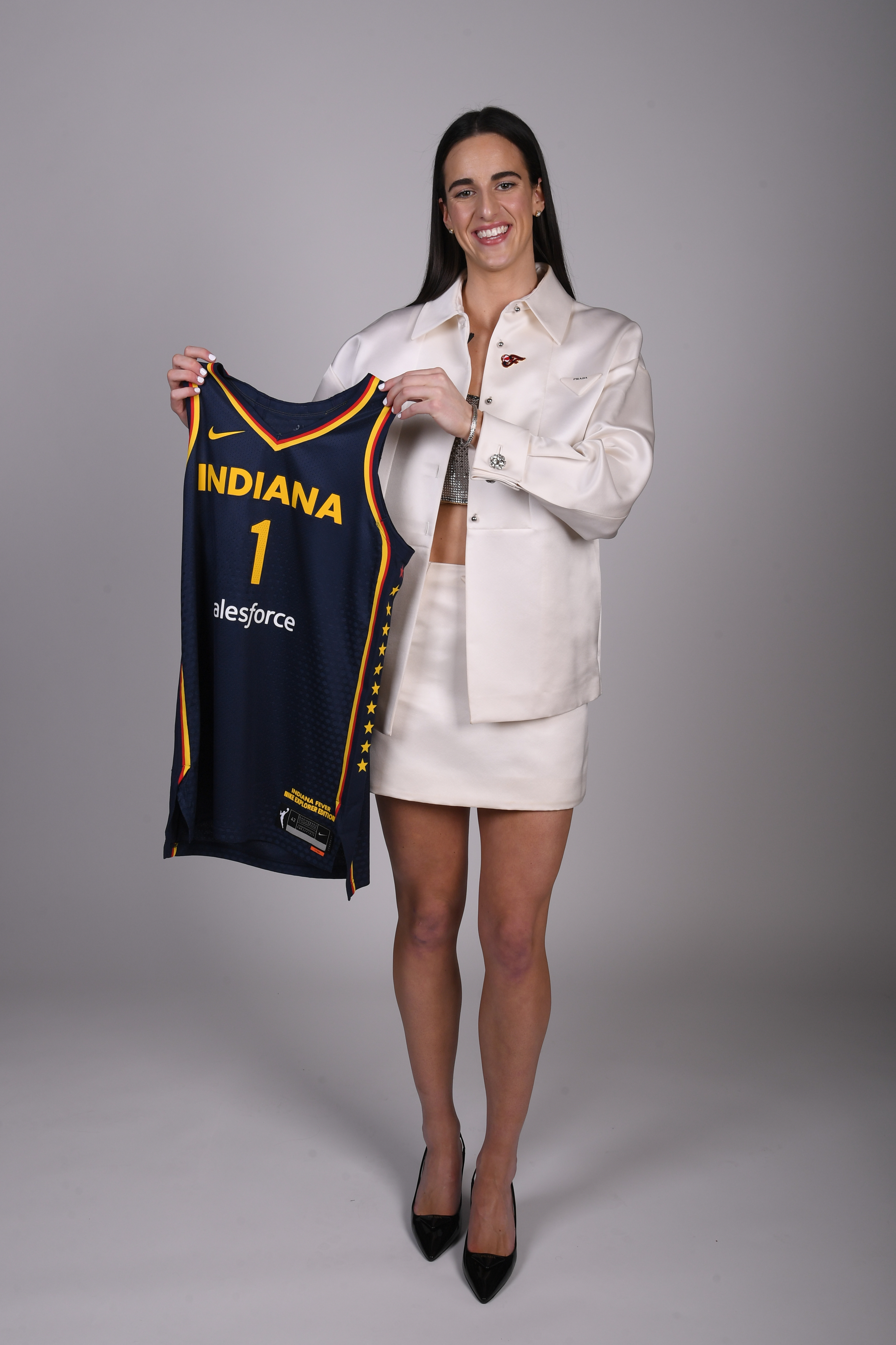 Caitlin Clark at the 2024 WNBA draft wearing Prada