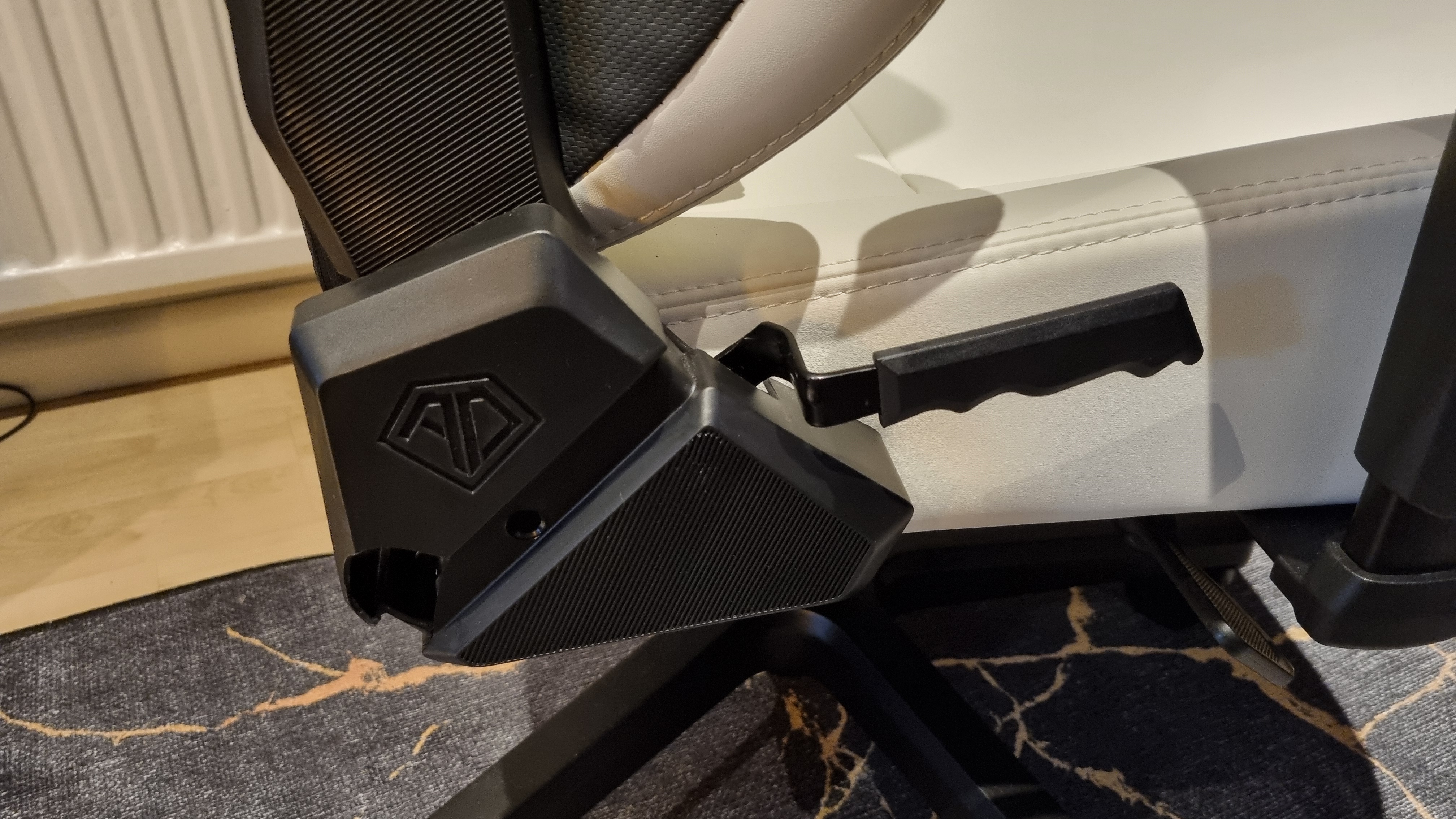 The recline handle of the AndaSeat Kaiser 4 XL