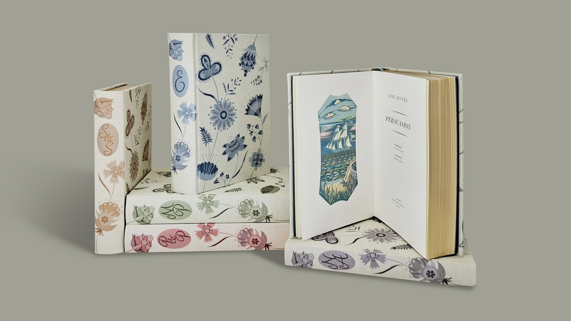 The Complete Novels by Jane Austen, The Folio Society book collection stack with one book open at an illustrated page