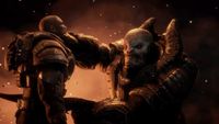 A powerful, armored creature holds a bald, armored man by the chin amid a fiery background, conveying a tense, confrontational atmosphere.