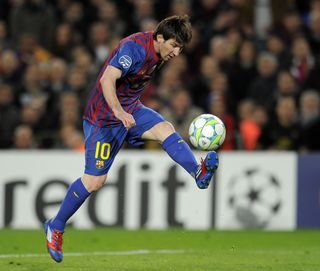 Lionel Messi scores for Barcelona against Bayer Leverkusen in the Champions League in March 2012.