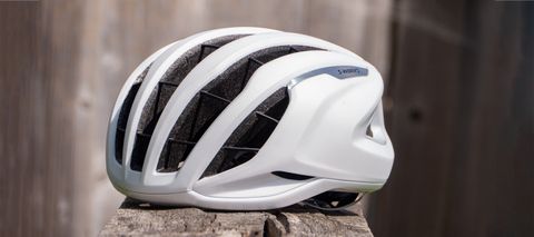Specialized Prevail III helmet on a bench