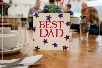 A Father's Day card reading 'best day' on a table