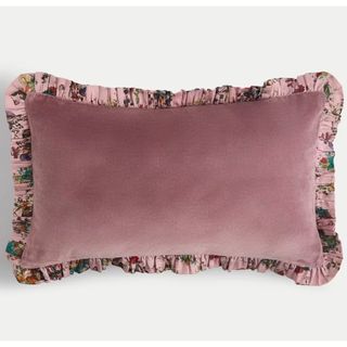 pink bolster cushion with floral ruffle trim