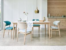 dining room with contemporary wooden furniture made light with the use of sunpipes image by nest