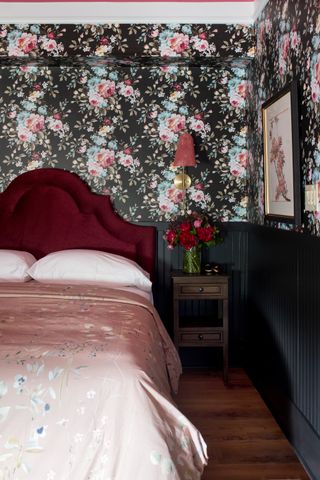 dark bedroom with floral wallpaper by LH Designs