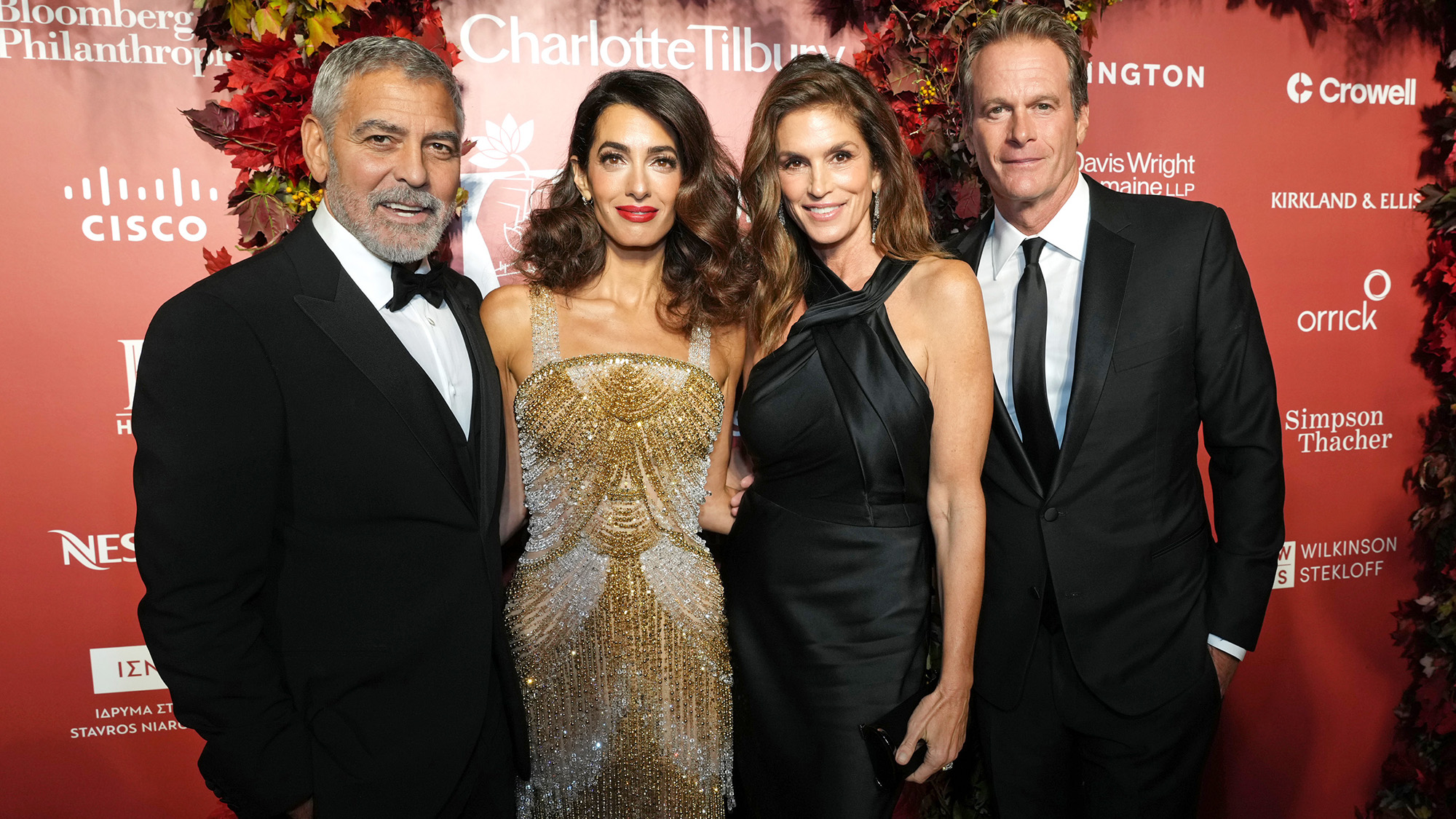 George Clooney, Amal Clooney, Cindy Crawford and Rande Gerber attend the Clooney Foundation For Justice Inaugural Albie Awards at New York Public Library back in 2022. They are in black tie. 