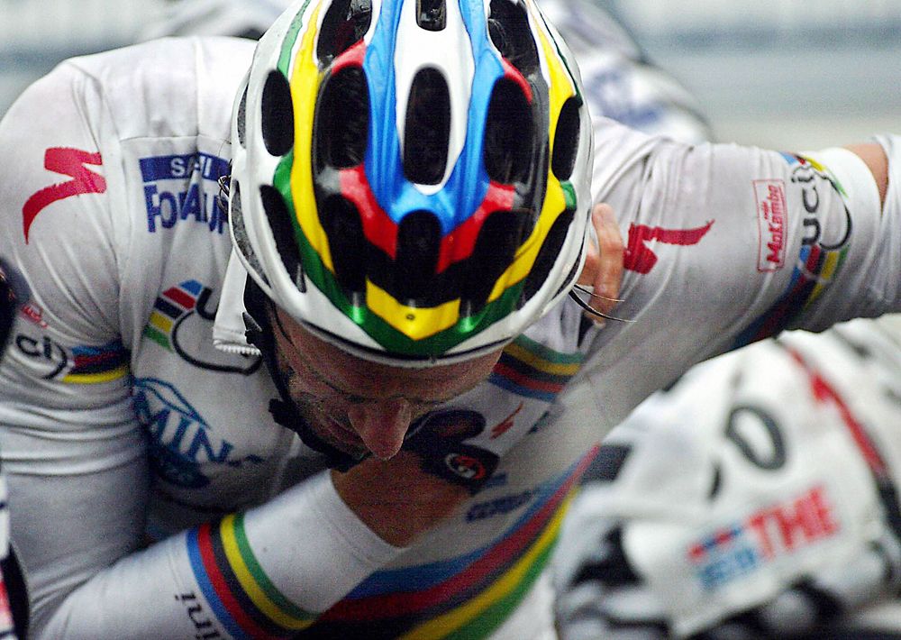 Stage 11 of the 2003 Giro - Mario Cipollini as world champion, taken down in the final turn on a wet finish
