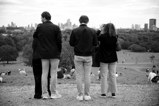 Image of tourists standing at the top of Primrose Hill, in black-and-white, taken on the Sigma 18-50mm f/2.8 DC DN | C Canon RF